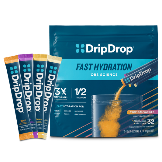 dripdrop-tropical-variety-pack-electrolyte-powder-8-oz-sticks-32-count-u1 Tropical_Variety_-_32ct_-_Transparent.png